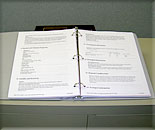 Three-ring binder with emergency plans